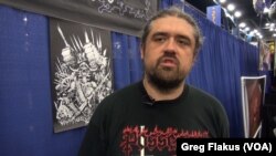 Former commercial artist Daniel Shaw has designed and sold a wide range of detailed fantasy figures on posters and T-shirts for 20 years. He had a booth at Comicpalooza this past weekend, in Houston.