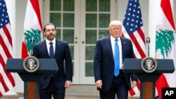 Le président américain Donald Trump au cours d'une conférence de presse en présence du Premier ministre libanais Saad Hariri à la Maison Blanche, Washington, 25 juillet 2017.