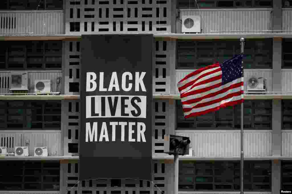 A large Black Lives Matter banner is seen at the U.S. embassy in Seoul, South Korea, June 14, 2020.