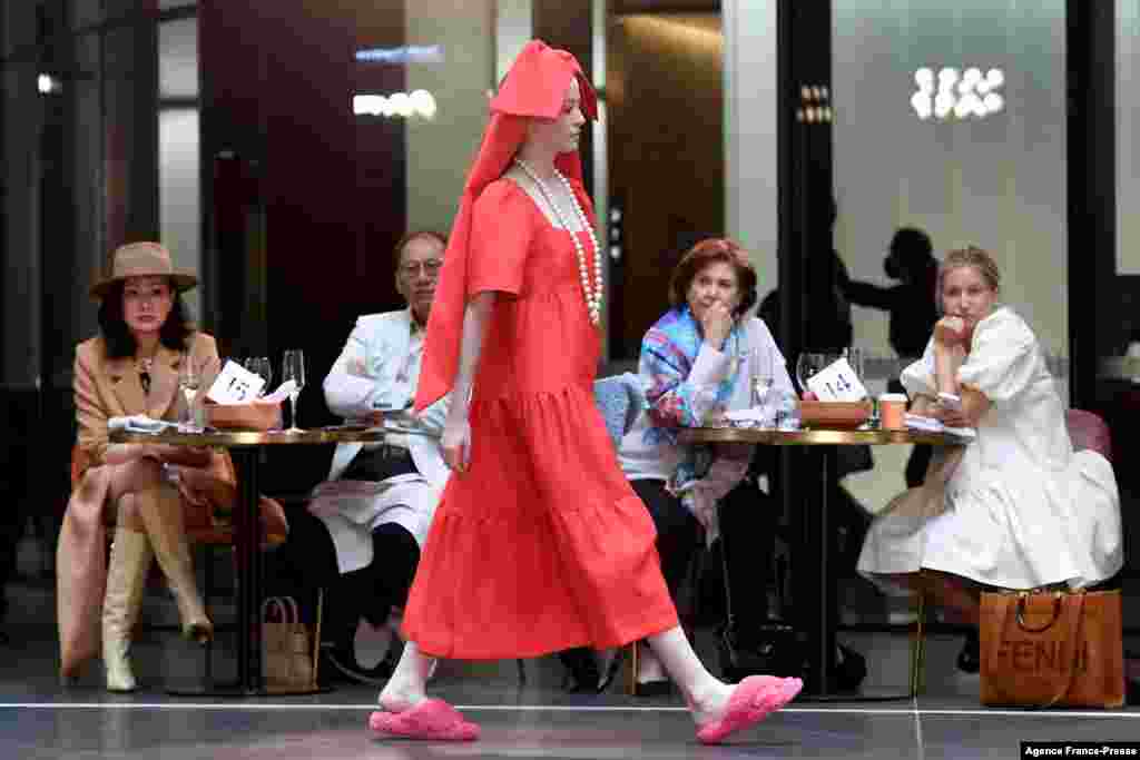 A model shows an outfit by Australian label Corepret at Melbourne Fashion Week in Melbourne.