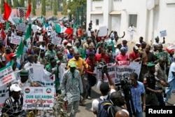 Anti-government protesters are seen during a rally in Abuja, Nigeria, Feb. 9, 2017.