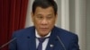 FILE - Philippine President Rodrigo Duterte delivers a speech at the official resident of Japanese Prime Minister Shinzo Abe in Tokyo, Oct. 30, 2017.