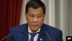 FILE - Philippine President Rodrigo Duterte in Tokyo, Oct. 30, 2017.