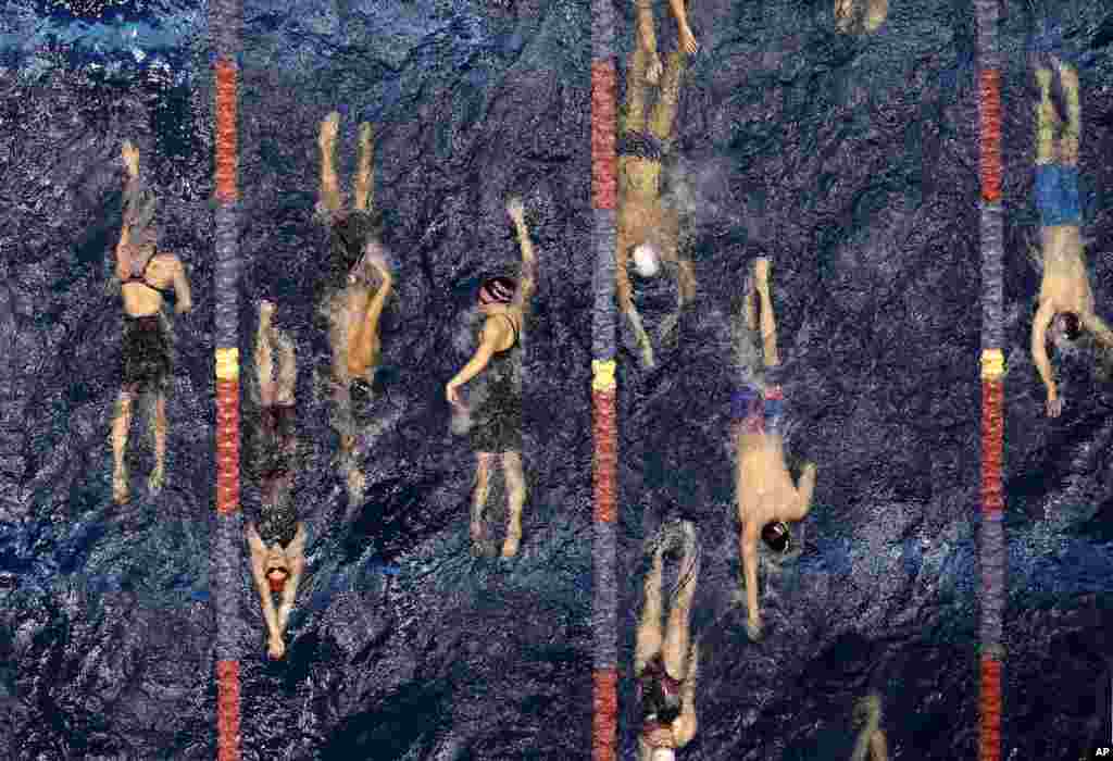 Swimmers warm-up during the U.S. Winter Nationals swimming event in Federal Way, Washington.