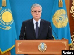 Kazakh President Kassym-Jomart Tokayev speaks during a televised address to the nation following the protests triggered by fuel price increase in Nur-Sultan, Kazakhstan, Jan. 7, 2022.