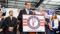 Former Texas Gov. Rick Perry announces the launch of his campaign for the 2016 Republican presidential nomination in Addison,Texas, June 4, 2015.