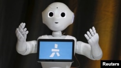 Pepper, an emotional Robot, greets conference attendees during the Wall Street Journal Digital Live (WSJDLive) conference at the Montage hotel in Laguna Beach, California October 20, 2015.