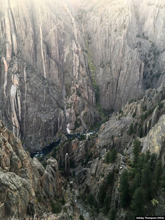 The Gunnison River is seen flowing through Black Canyon