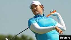 Ariya Jutanugarn (THA) of Thailand reacts after hitting her tee shot on the third hole during first round women's Olympic golf competition, Rio, Brazil 