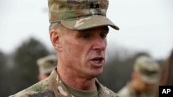 Maj. Gen. Malcolm B. Frost, commanding general for the U.S. Army Center for Initial Military Training, U.S. Army Training and Doctrine Command watches troops participate in the new Army combat fitness test at Fort Bragg, N.C., Jan. 8, 2019.