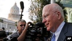 FILE - U.S. Senator Patrick Leahyvfrom Vermont leaves after giving a press conference near the capitol building in Havana, Cuba, Jan. 19, 2015.