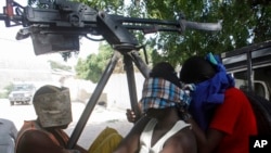 FILE - Captured suspected al-Shabab militants are seen in Mogadishu, Somalia, Dec. 25, 2014.