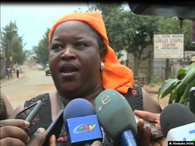 Clotilda Wah, spokesperson of the Northwest and Southwest Women's Task Force, speaks during a protest in Bamenda, Cameroon. (M. Kindzeka/VOA)