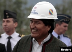 FILE - Bolivia's President Evo Morales smiles during the inauguration of a gas plant in Yacuiba, south of La Paz, Aug. 24, 2015.