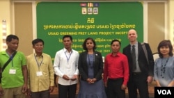 Veena Reddy, USAID mission director, and Matthew Edwardsen, USAID Green Prey Lang Project​ party chief are pictured with five other activists in Phnom Penh, Cambodia, April 3, 2019. (Tum Malis/VOA Khmer) 