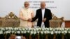India's Prime Minister Narendra Modi (left) and Afghanistan's president Ashraf Ghani shake hands during the inauguration of the Salma Dam in Herat province, Afghanistan, June 4, 2016.
