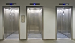 This is a bank of elevators. (When there is more than two elevators in an area, we call it a "bank.")