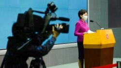 香港特首林鄭月娥在香港的一個記者會上宣布進行立法會選舉制度改革計劃（路透社2021年3月8日）