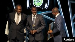 Somali Football Federation (SFF) President Abdiqani Said Arab receives the Leader of the Year award at the Confederation of African Football (CAF) awards in Abuja, Nigeria, Jan. 7, 2016. The SFF announced that Somalia will again host international matches.