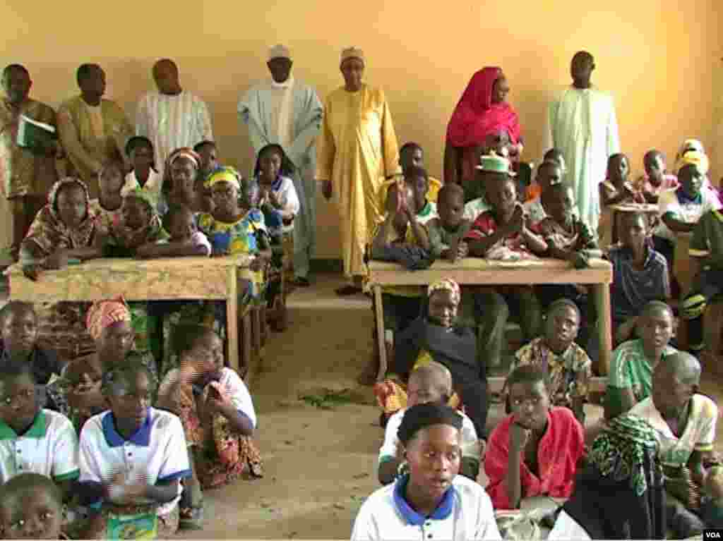 Parents visit the school in Limani, Cameroon, to see their children in class. (M.E. Kinzeka/VOA)