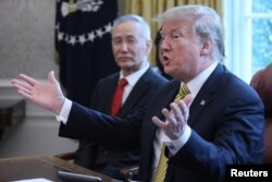 U.S. President Donald Trump speaks while meeting with China's Vice Premier Liu He in the Oval Office of the White House in Washington, April 4, 2019.