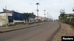 An empty street is seen at the start of a three-day national lockdown in Freetown, September 19, 2014.