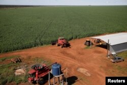 A harvesting machine is seen at a corn field near the town of Campo Novo do Parecis, Brazil, April 26, 2018.