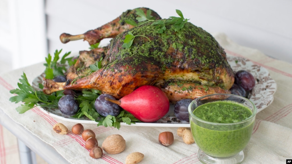 This Sept. 29, 2014, photo shows herb roasted Thanksgiving turkey in Concord, N.H. (AP Photo/Matthew Mead)