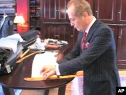 Washington tailor Irfan Baytok will charge a young law student from Georgia more than $2,800 for this seersucker suit he is making.
