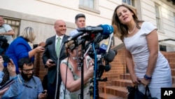 FILE - Canadian Foreign Affairs Minister Chrystia Freeland speaks to members of the media as she arrives at the Office of the United States Trade Representative, Aug. 28, 2018, in Washington. 