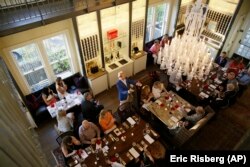 In this photo taken Wednesday, June 5, 2019, Jean-Charles Boisset talks about the wines available in the tasting room at 1881 Napa in Oakville, Calif.