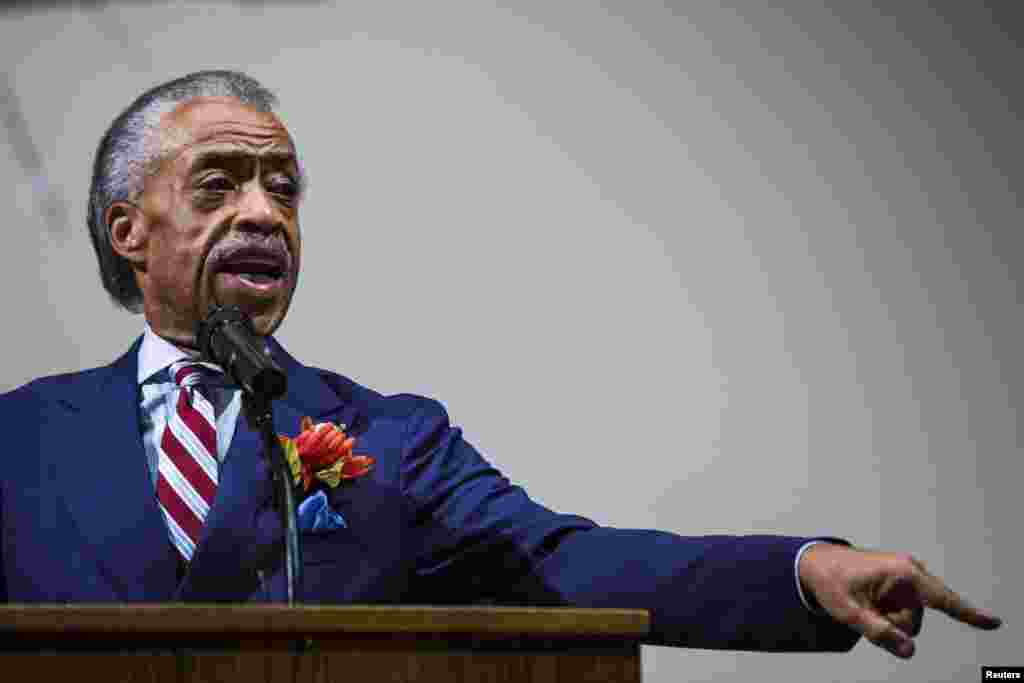 Civil rights leader Rev. Al Sharpton speaks to a community gathering at Greater St. Mark Family Church in Ferguson, Missouri, August 17, 2014.
