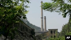 FILE - Ninh Binh Power Plant, which is a coal fired power plant to supply electricity, is seen in Ninh Binh Province in Vietnam, Sept. 19, 2007. The Asian Development Bank agreed Friday to loan Vietnam nearly $1 billion to build a coal-fired power plant as the booming country scrambles to keep up with its surging demand for power. 