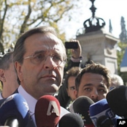 Antonis Samaras addresses the media after meeting Greek president Karolos Papoulias, at the Presidential Palace in Athens, November 6 2011.