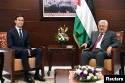FILE - Palestinian President Mahmoud Abbas meets with White House senior adviser Jared Kushner in the West Bank City of Ramallah, June 21, 2017.