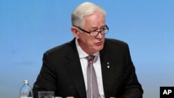 FILE - Australia’s Minister for Trade and Investment Andrew Robb attends a press conference at the signing of the Trans-Pacific Partnership Agreement in Auckland, New Zealand, Feb. 4, 2016. 