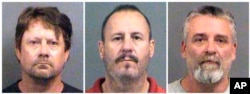 FILE - Booking photos from Oct. 14, 2016 show from left, Patrick Stein, Curtis Allen and Gavin Wright, three members of a Kansas militia group who were charged with plotting to bomb an apartment building filled with Somali immigrants.
