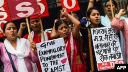Indian women protest against the rape of a young girl in Mandsaur, Madhaya Pradesh state, in New Delhi, June 30, 2018. 