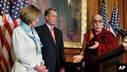 The Dalai Lama makes his remarks on Capitol Hill in Washington, Thursday, July 7, 2011, as he is welcomed by House Speaker John Boehner of Ohio, and House Minority Leader Nancy Pelosi of Calif. . (AP Photo/Manuel Balce Ceneta)