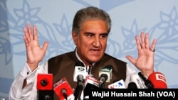 FILE - Pakistani Foreign Minister Shah Mehmood Qureshi speaks during a news conference in Islamabad, Aug. 24, 2018.