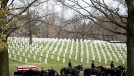 A funeral procession at Arlington National Cemetary.