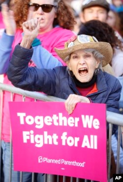 A demonstrator expresses her support for Planned Parenthood during the Women's March in Los Angeles, Jan. 19, 2019.