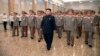 North Korea's Kim Jong Un Appears Limping on State TV at Ceremony