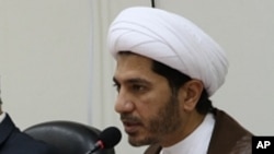 FILE - Sheikh Ali Salman, now on trial for allegedly advocating an overthrow of the Bahrain regime, speaks at a news conference in Umm Al Hassam, Bahrain, Feb. 15, 2012.