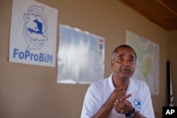 FILE - Marine Biologist Jean Wiener speaks during an interview at Caracol Bay near Cap Haitien, Haiti, May 13, 2015.