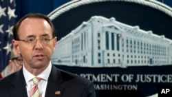 FILE - Deputy Attorney General Rod Rosenstein speaks during a news conference in which he announced an indictment against Iranian hackers in an alleged cybercrime and extortion scheme, at the Department of Justice in Washington, Nov. 28, 2018.