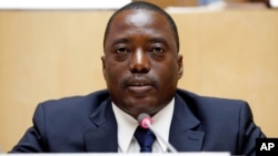 FILE - Democratic Republic Congo's President Joseph Kabila attends a meeting at the African Union Headquarters in Addis Ababa, Ethiopia, Feb. 24, 2013. Talks started Dec. 13, 2016, to decide who will run the country after Kabila's second term ends Dec. 19, 2016.