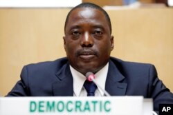 FILE - DRC President Joseph Kabila is pictured at a meeting at African Union headquarters in Addis Ababa, Ethiopia, Feb. 24, 2013.