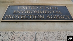 FILE - A marker on the outside of the Environmental Protection Agency building in Washington.