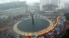 FILE - A traffic jam during heavy rain at the main roundabout in Jakarta, Indonesia.